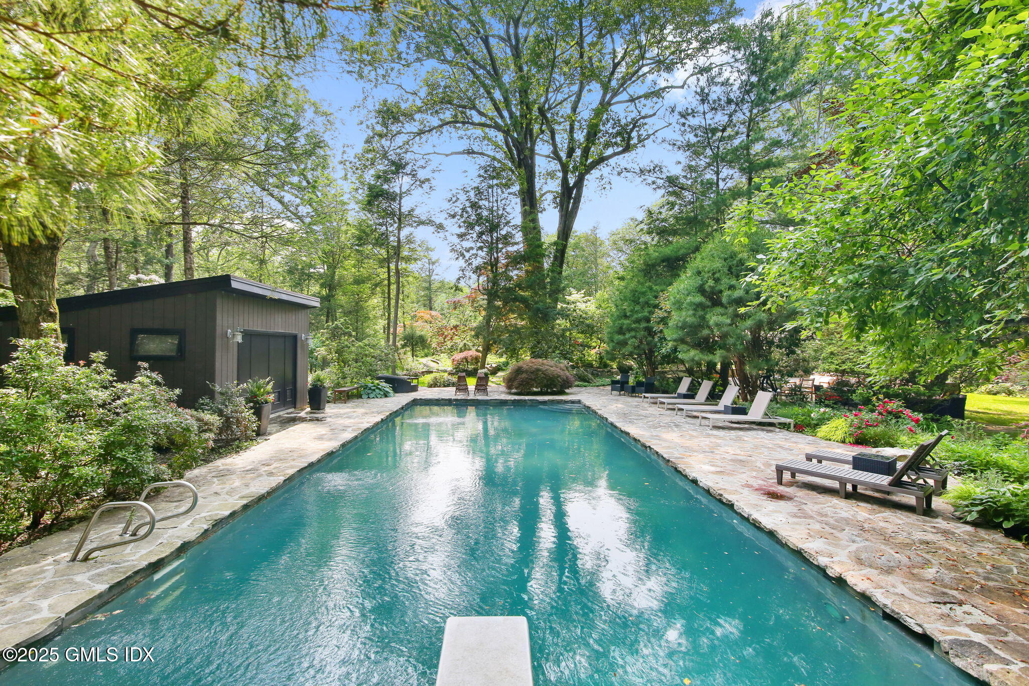 21 Hycliff Road Greenwich, CT 06831 - Photo 19 of 25 a view of swimming pool from a lake view