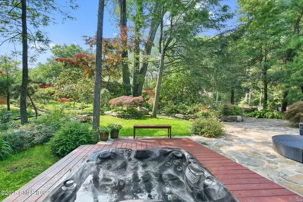 a view of a garden with a bench