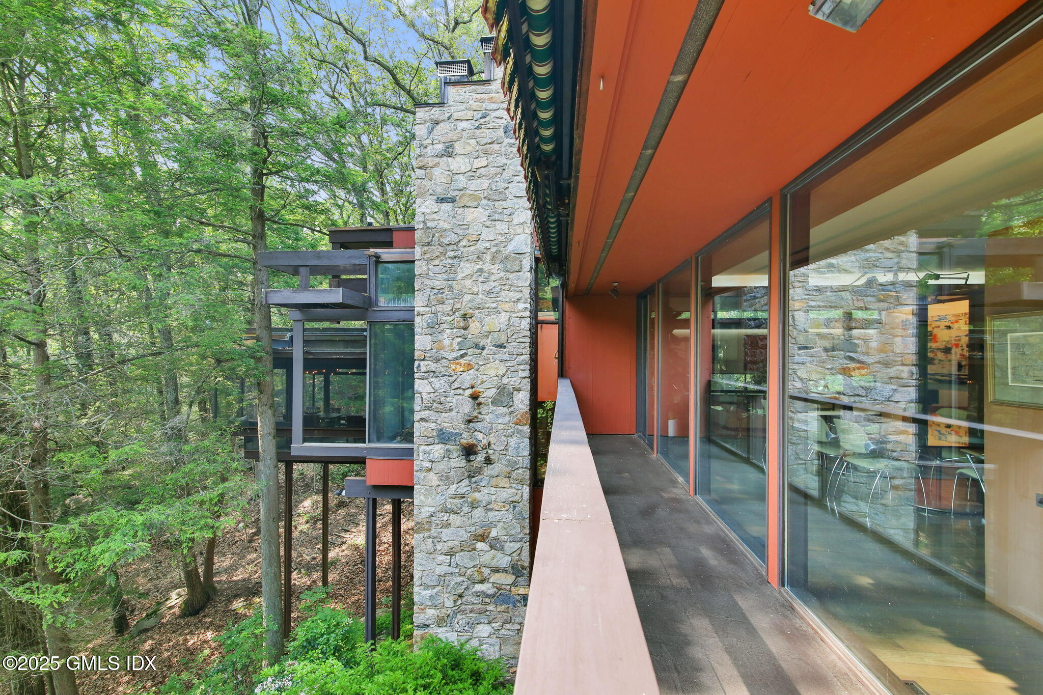 21 Hycliff Road Greenwich, CT 06831 - Photo 22 of 25 a pathway of a house with a yard