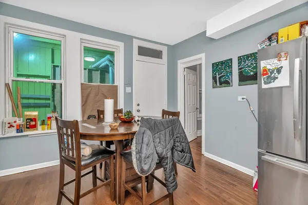 a kitchen with stainless steel appliances a stove a sink and a microwave