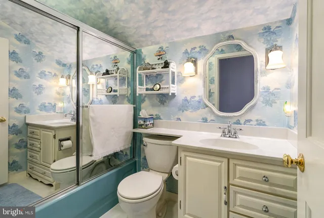 a view of a chairs and tables in the patio