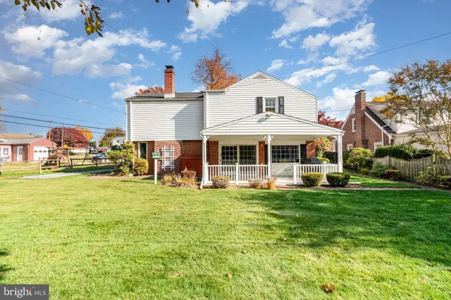 a view of a house with a big yard