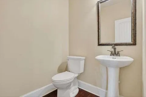 a bathroom with a sink and a toilet