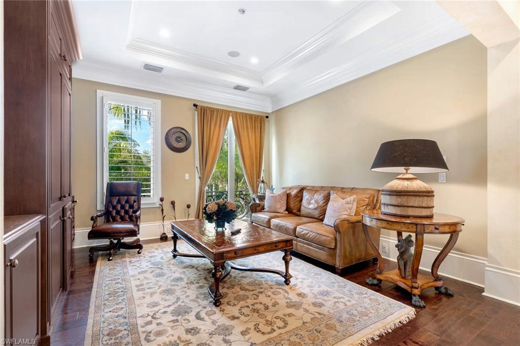 14927 Celle Way Naples, FL 34110 - Photo 26 of 31 a living room with furniture and a window