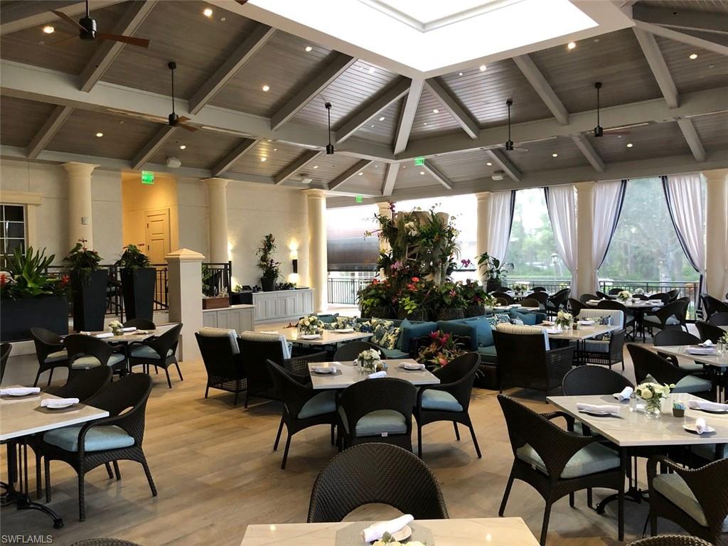 14927 Celle Way Naples, FL 34110 - Photo 30 of 31 a view of a dining room with furniture window and outside view