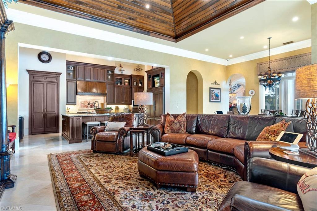 14927 Celle Way Naples, FL 34110 - Photo 10 of 31 a living room with furniture and a large window