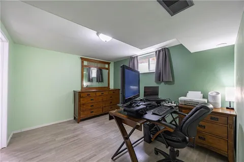 a workspace with furniture and window