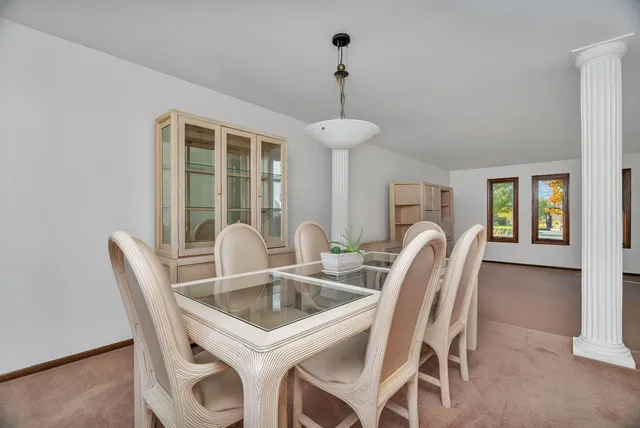 a table and chairs in a room