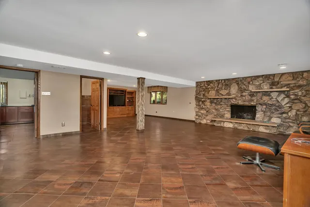 a view of a living room with a flat screen tv
