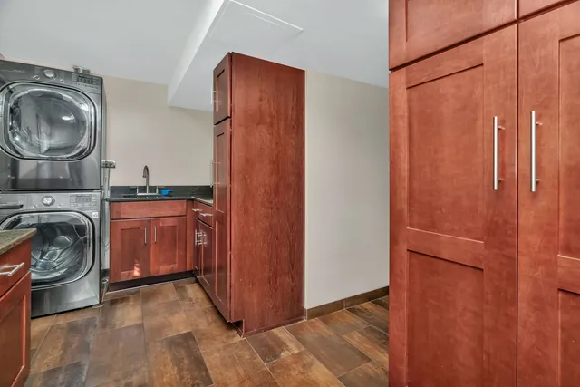 a view of a kitchen cabinets and a window
