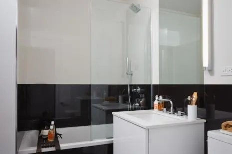 a room with a sink and cabinets