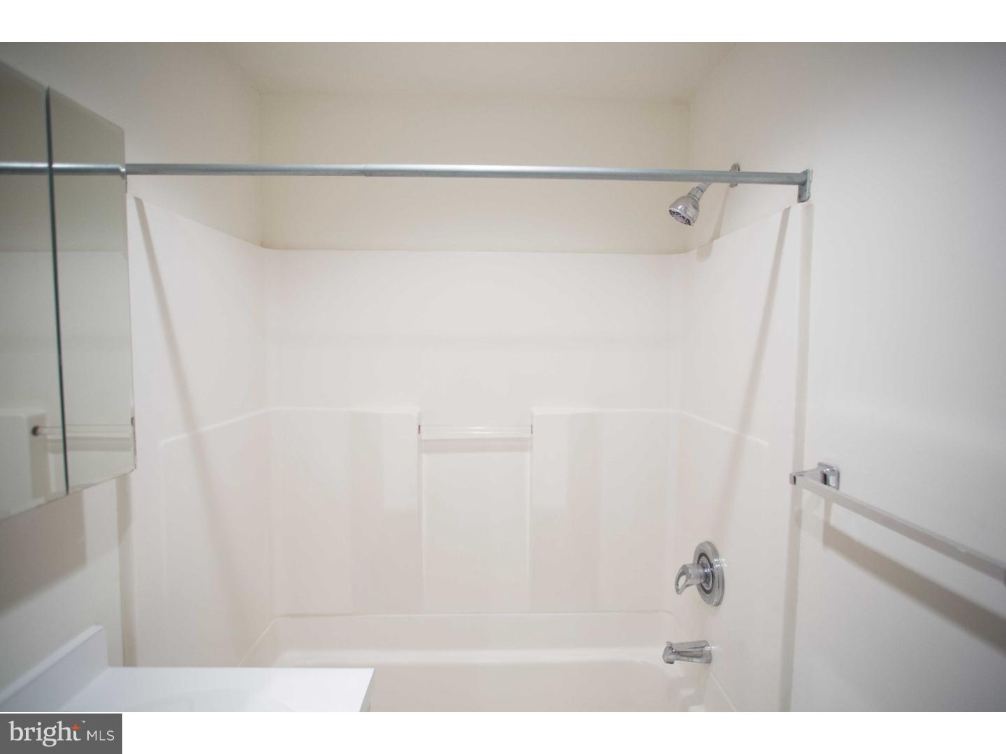 1600-7 Walnut Street, Unit 706 Philadelphia, PA 19103 - Photo 17 of 25 a bathroom with a shower