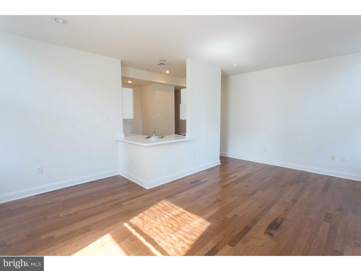 1600-7 Walnut Street, Unit 706 Philadelphia, PA 19103 - Photo 7 of 25 a view of an empty room and wooden floor