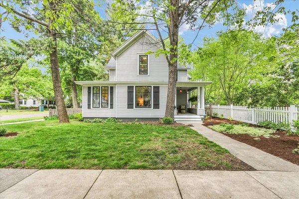front view of a house with a yard