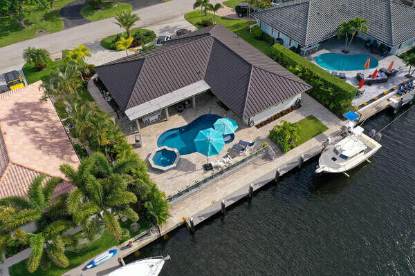 839 Enfield Street Boca Raton, FL 33487 - Photo 1 of 36 an aerial view of a house having yard