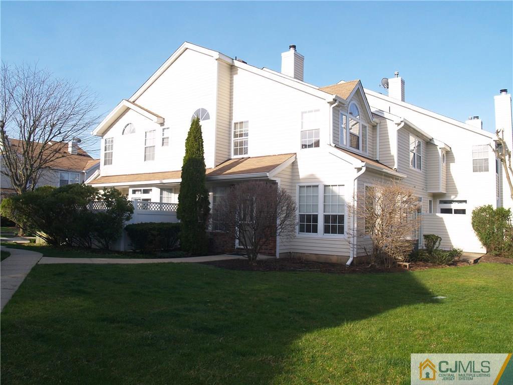 18 High Pond Lane, Unit 18 Bedminster, NJ 07921 - Photo 1 of 19 a front view of a house with a yard