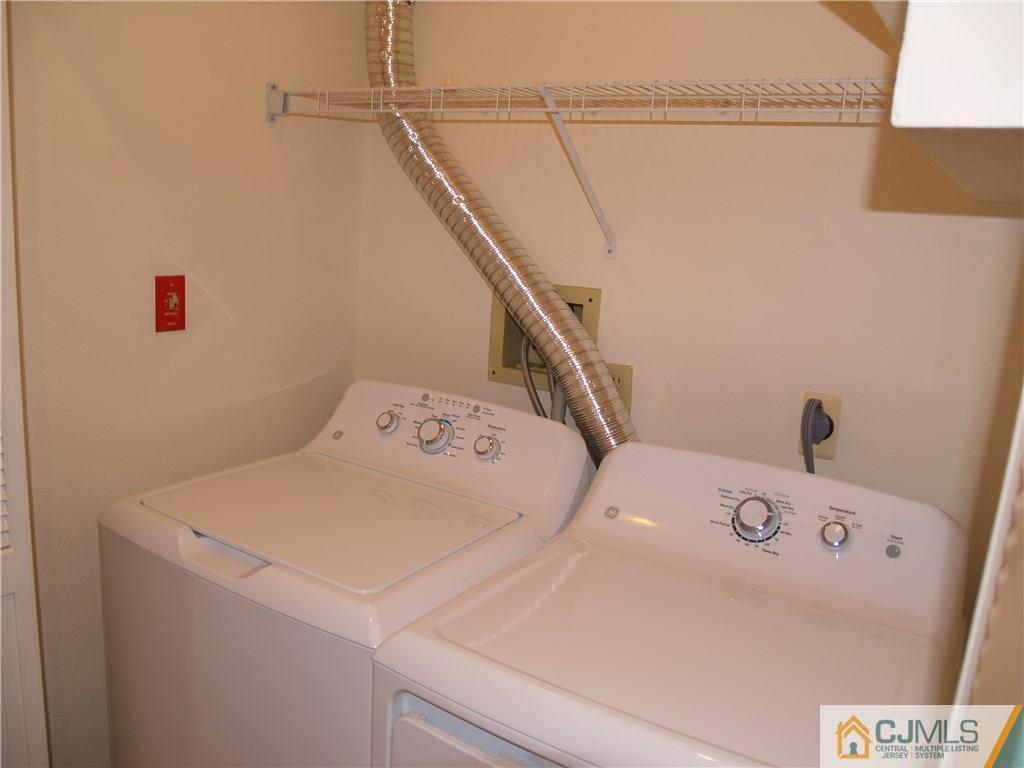 18 High Pond Lane, Unit 18 Bedminster, NJ 07921 - Photo 12 of 19 a utility room with dryer and washer
