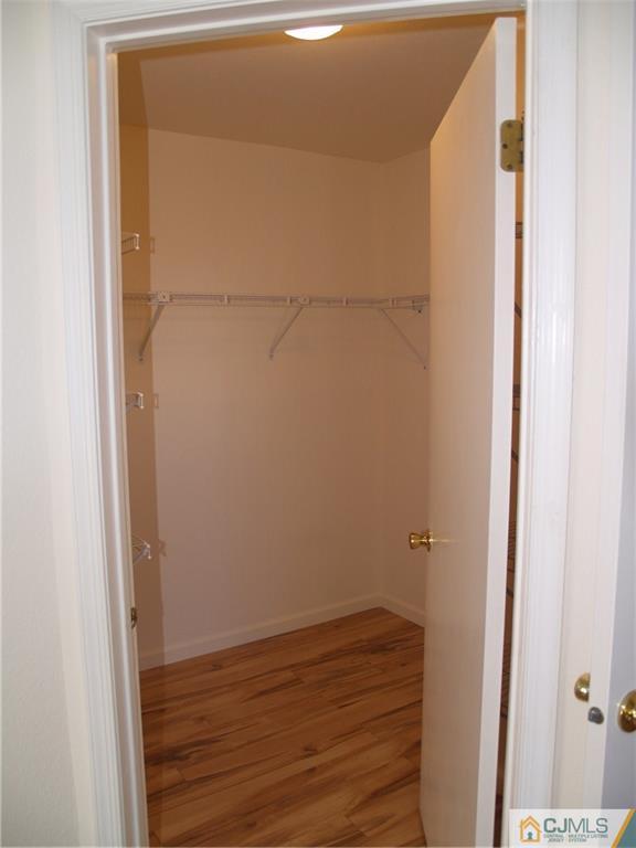 18 High Pond Lane, Unit 18 Bedminster, NJ 07921 - Photo 18 of 19 a view of small space with wooden floor