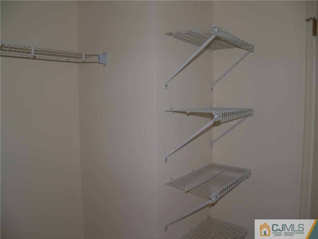 18 High Pond Lane, Unit 18 Bedminster, NJ 07921 - Photo 19 of 19 a view of small space with racks on the wall