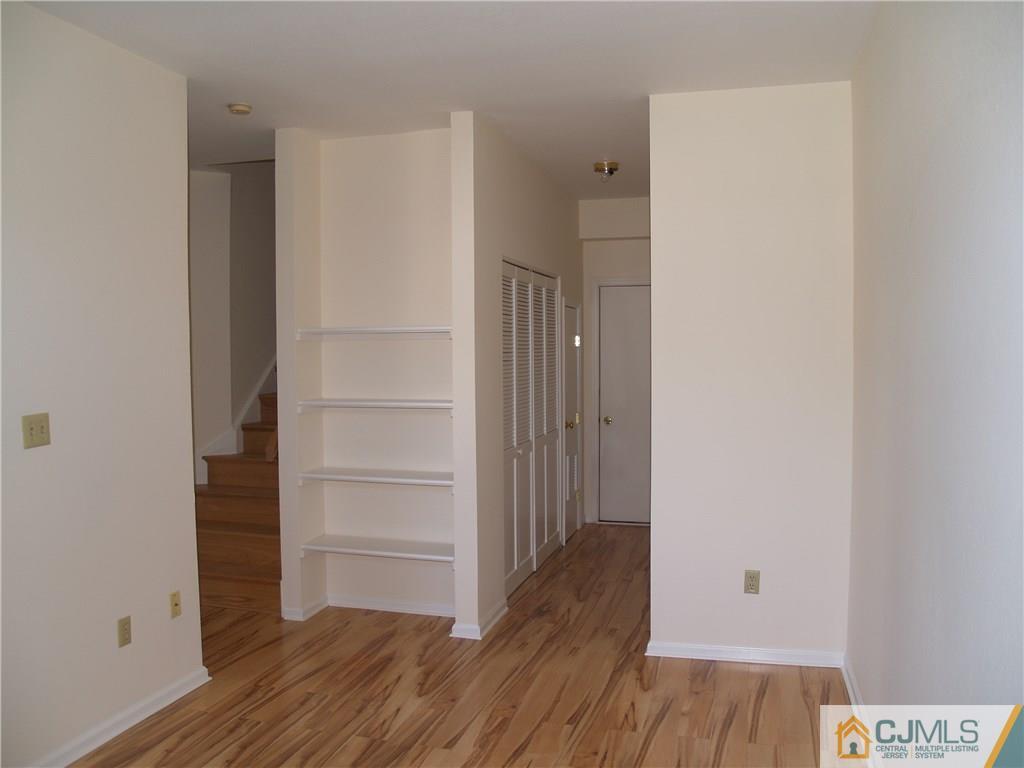 18 High Pond Lane, Unit 18 Bedminster, NJ 07921 - Photo 7 of 19 a view of walk in closet with wooden floor
