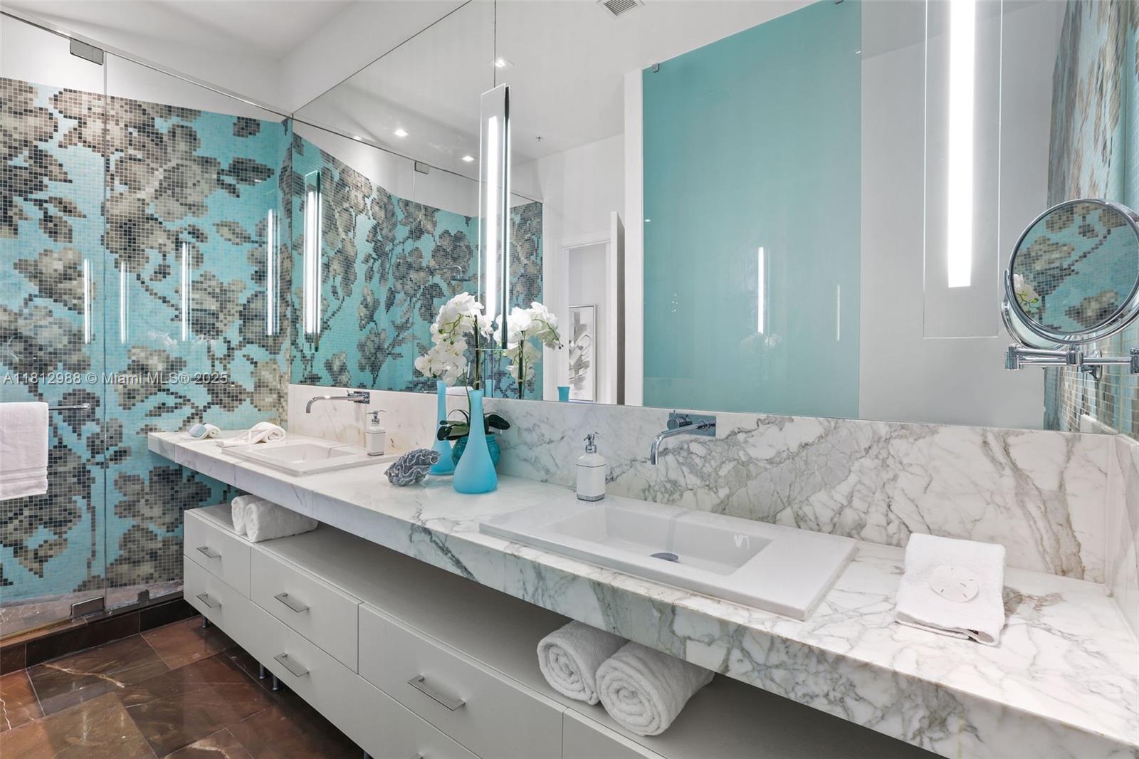 2001 Meridian Avenue, Unit 101 Miami Beach, FL 33139 - Photo 17 of 59 a living room with furniture and a large mirror