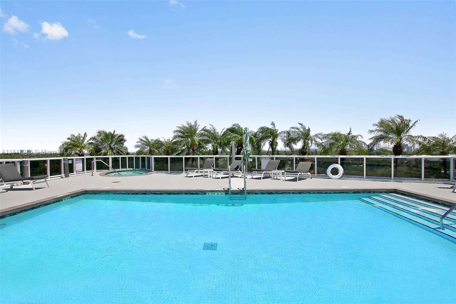 2001 Meridian Avenue, Unit 101 Miami Beach, FL 33139 - Photo 50 of 59 a view of a house with swimming pool