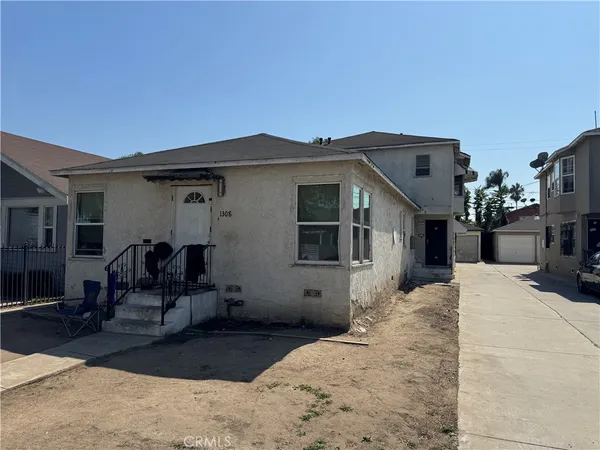 a view of a house with a patio