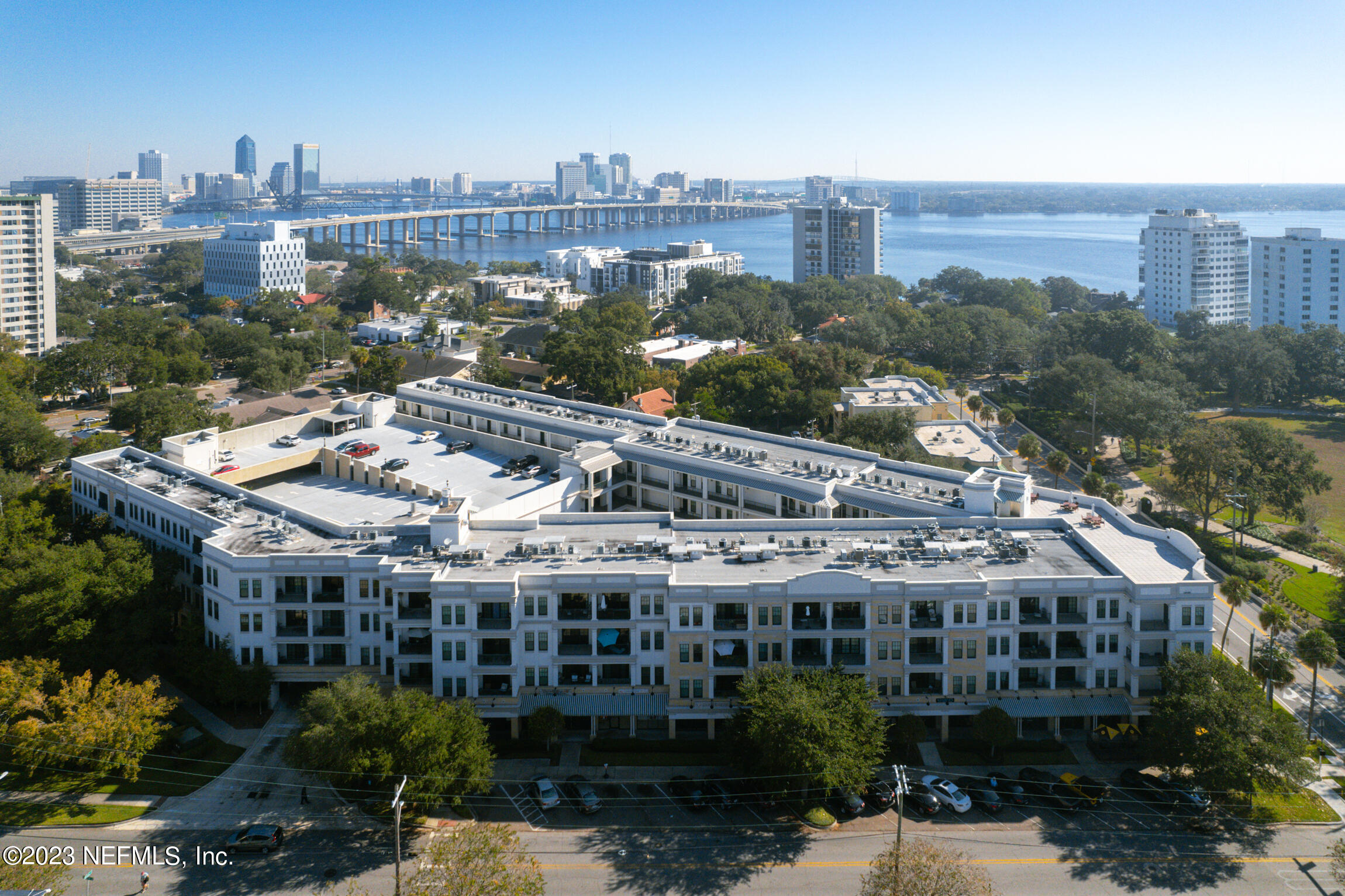 1661 Riverside Avenue, Unit 110 Jacksonville, FL 32204 - Photo 3 of 47 a view of a large building with a lot of trees