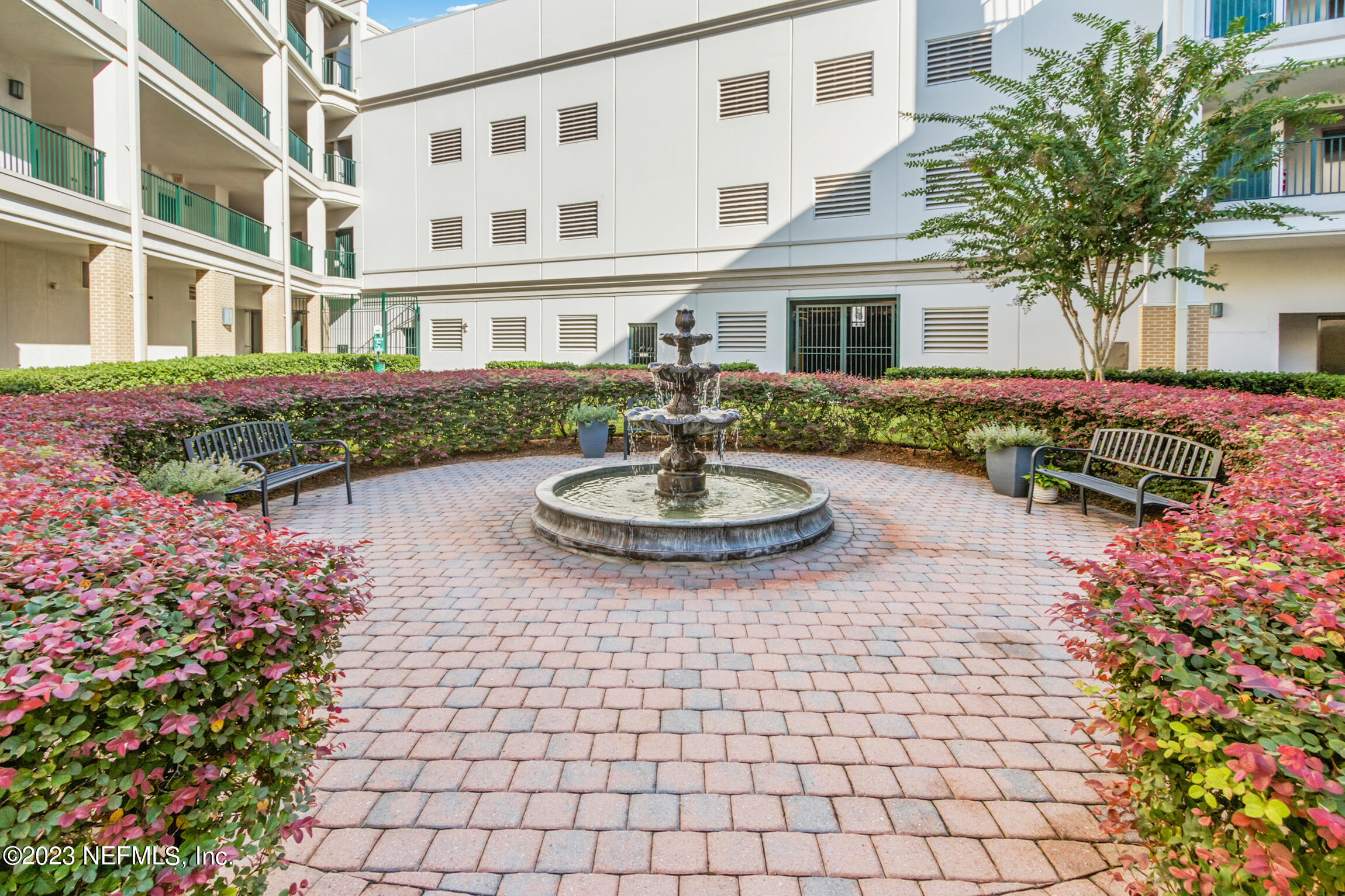 1661 Riverside Avenue, Unit 110 Jacksonville, FL 32204 - Photo 9 of 47 a front view of a house with entertaining space