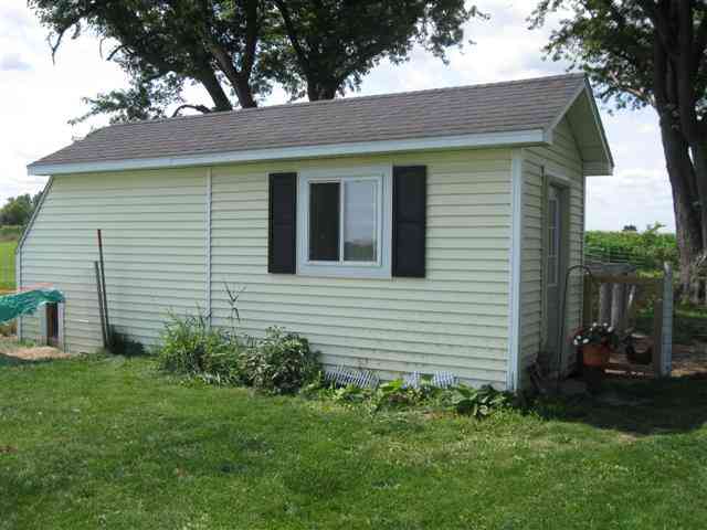 7206 North Crossroads Road Lena, IL 61048 - Photo 12 of 12 a view of a house with a backyard
