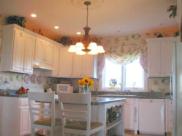 7206 North Crossroads Road Lena, IL 61048 - Photo 5 of 12 a kitchen with a sink cabinets and window