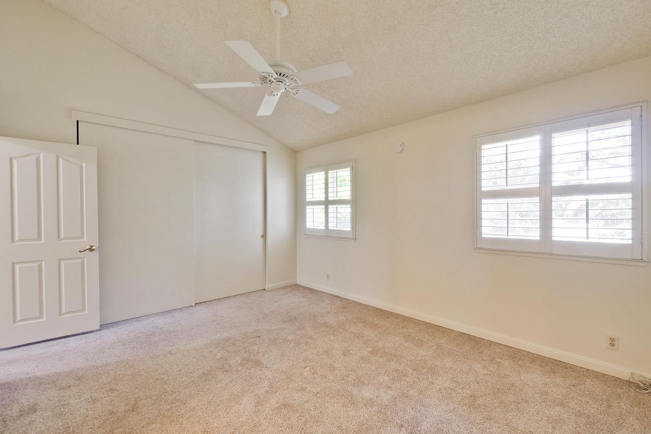 22903 Longdown Road Cupertino, CA 95014 - Photo 17 of 42 a view of an empty room with a window