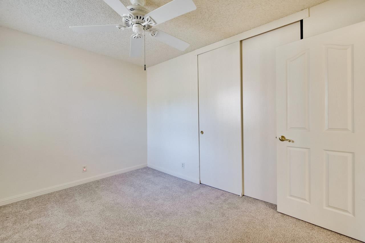 22903 Longdown Road Cupertino, CA 95014 - Photo 23 of 42 a view of a room with a chandelier fan