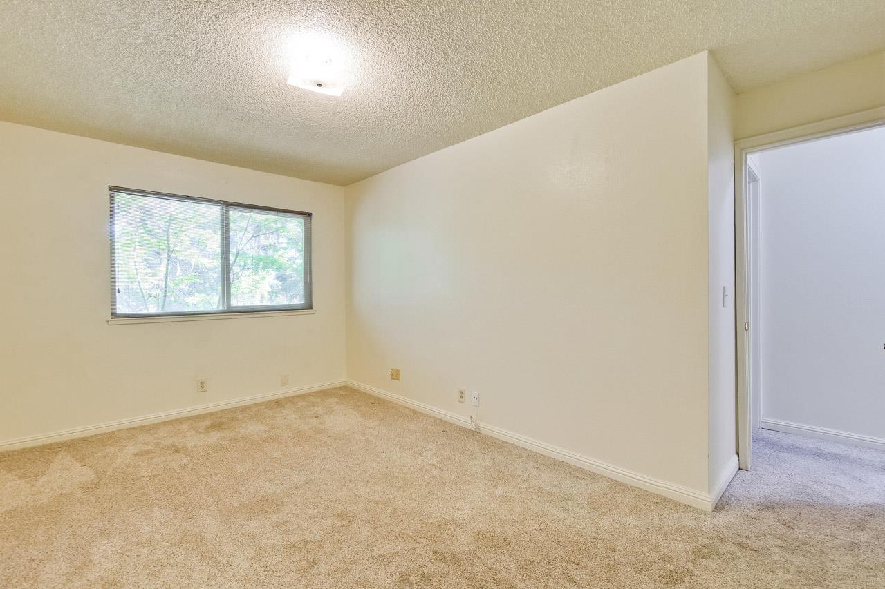 22903 Longdown Road Cupertino, CA 95014 - Photo 26 of 42 an empty room with windows