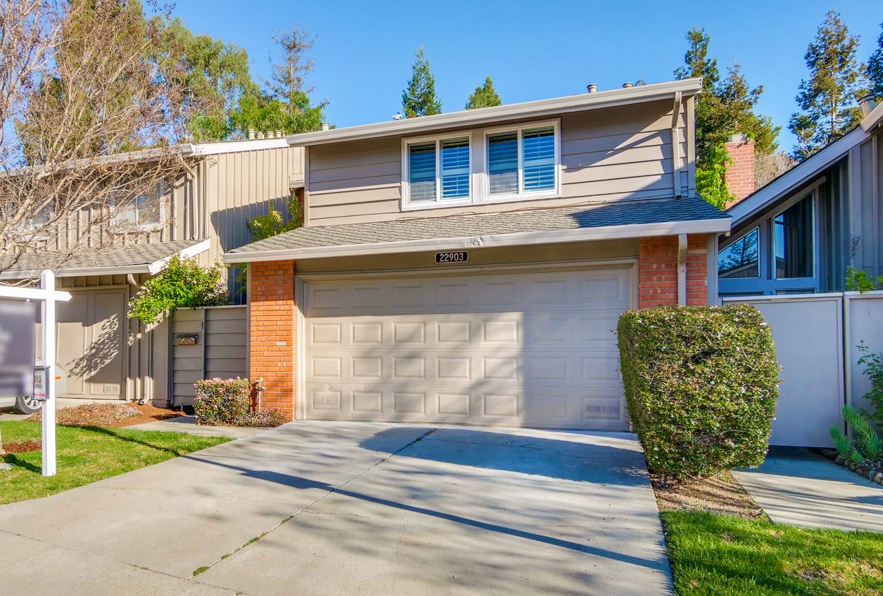 22903 Longdown Road Cupertino, CA 95014 - Photo 3 of 42 a front view of a house with garden
