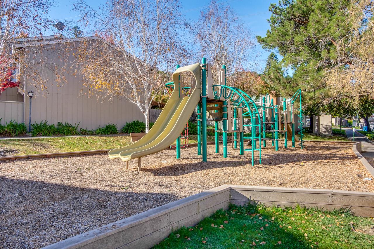 22903 Longdown Road Cupertino, CA 95014 - Photo 36 of 42 a view of a park with swings and slides