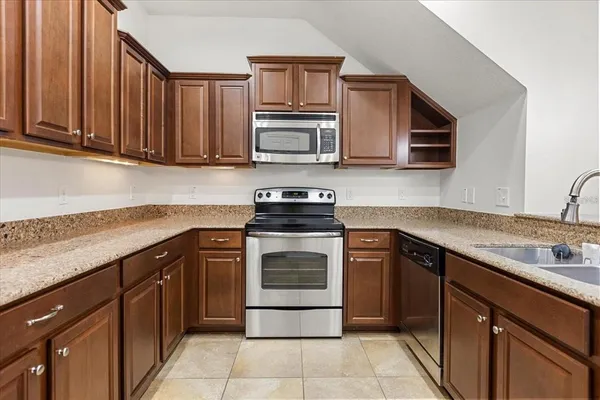 a bathroom with a sink vanity and a mirror