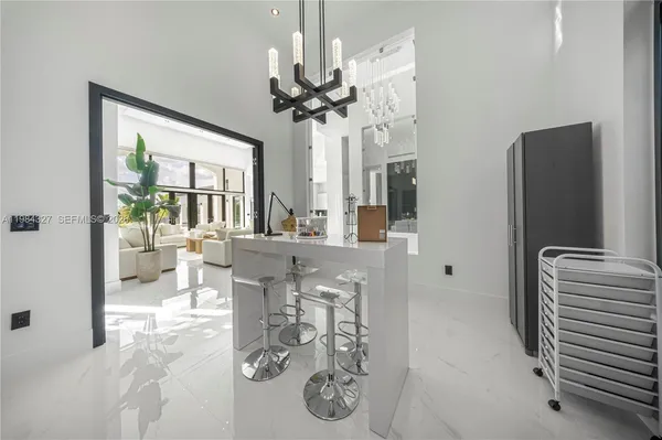 a spacious bedroom with a large bed and a window