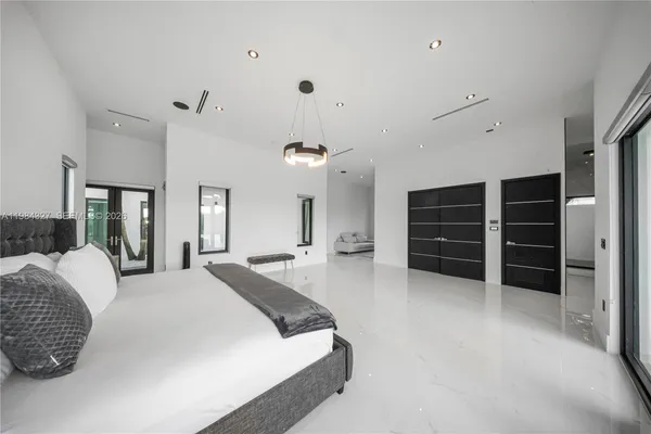 a bathroom with a shower and a sink