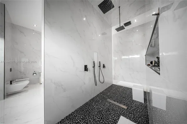 a view of a patio with table and chairs