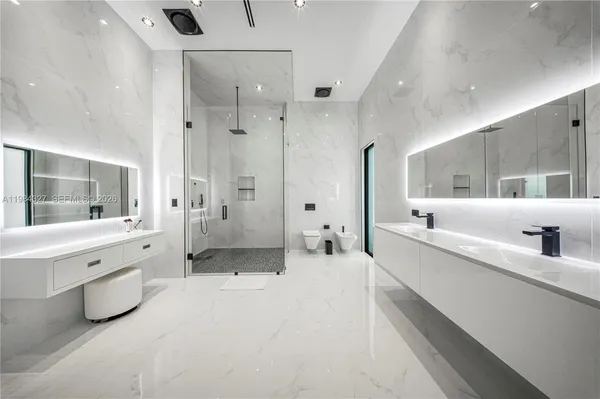 a view of a swimming pool with a patio and a yard