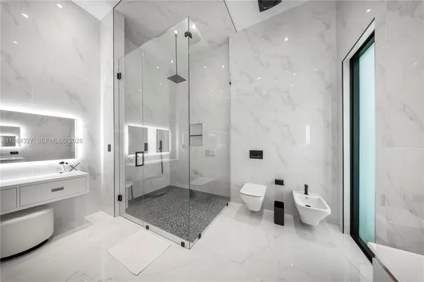 a view of a patio with swimming pool table and chairs