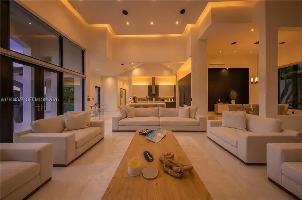 a view of living room with furniture and flat screen tv