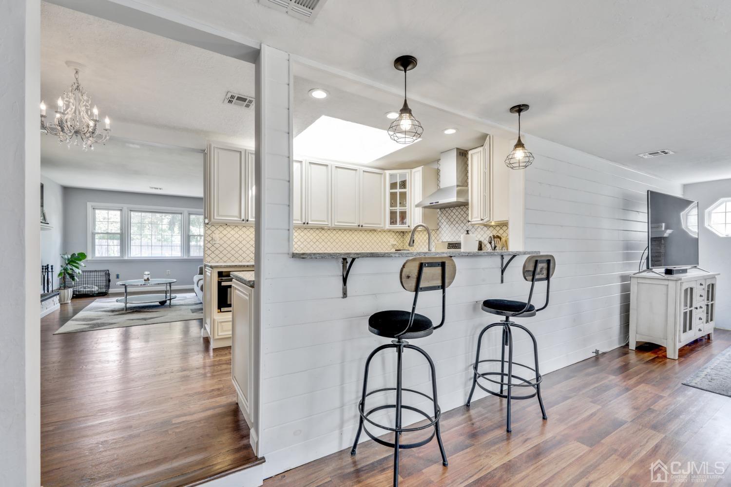 199 Jordan Road Colonia, NJ 07067 - Photo 9 of 24 a view of a kitchen and dining room