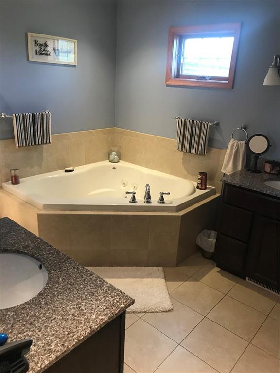 255 Huckleberry Road Indiana, PA 15701 - Photo 21 of 25 2nd Floor Guest Bathroom with Ceramic Tile Flooring and One Piece Bath/Shower