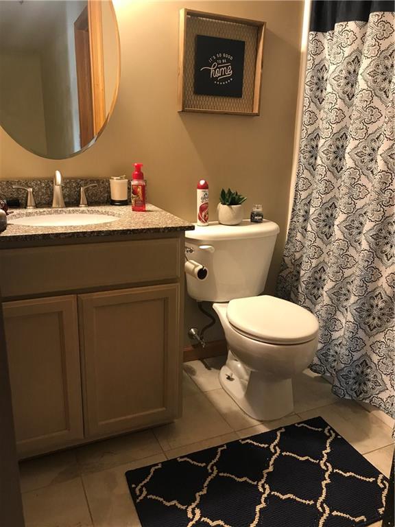 255 Huckleberry Road Indiana, PA 15701 - Photo 22 of 25 Bright and Spacious Main Bedroom with Bathroom Suite and Walk In Closet that leads to Full Bathroom with Jacuzzi Bath Tub and Two Sinks.