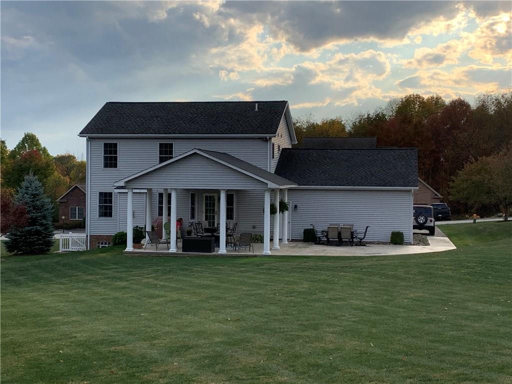 255 Huckleberry Road Indiana, PA 15701 - Photo 5 of 25 Back view from top of Large Back Yard. You can sit back and relax while enjoying the sunset from the covered patio.