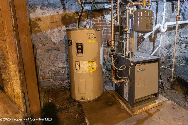 a view of hallway with wooden floor