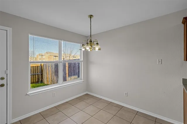 a kitchen that has a sink and a stove