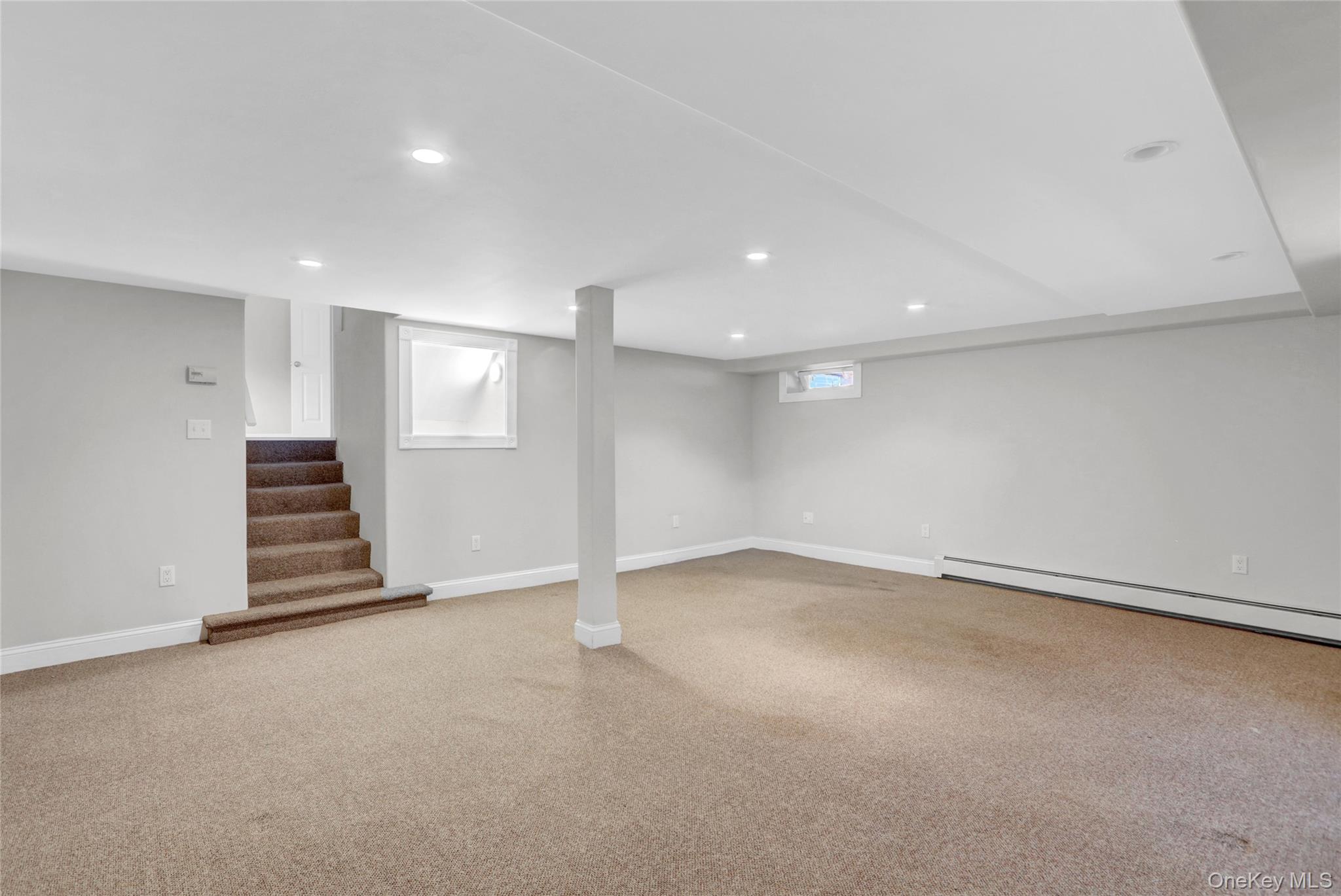 3621 Regent Lane Wantagh, NY 11793 - Photo 19 of 24 a view of an empty room with a fireplace